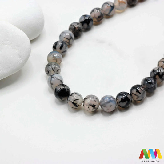 poludragi kamen ahat kristal kalcedon polu dragi poludrago kamenje dragulj mineral kvarc prirodni meditacija čakra zaštita snaga ravnoteža ljekovito perle stabilnost ahata jednog od najraznovrsnijih najljepših poludragih kamenja jedinstvenim trakama slojevima i šarenim uzorcima ahat je kamen stabilnosti uzemljenja i zaštite ahat u različitim oblicima od brušenih perli i glatkih kabošona do sirovih komada savršenih za izradu nakita meditaciju ili kao ukrasni element u vašem prostoru arte moda repromaterijal