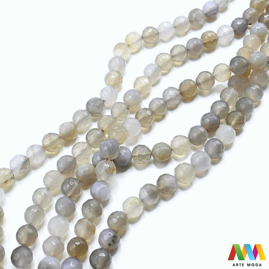 poludragi kamen ahat kristal kalcedon polu dragi poludrago kamenje dragulj mineral kvarc prirodni meditacija čakra zaštita snaga ravnoteža ljekovito perle stabilnost ahata jednog od najraznovrsnijih najljepših poludragih kamenja jedinstvenim trakama slojevima i šarenim uzorcima ahat je kamen stabilnosti uzemljenja i zaštite ahat u različitim oblicima od brušenih perli i glatkih kabošona do sirovih komada savršenih za izradu nakita meditaciju ili kao ukrasni element u vašem prostoru arte moda repromaterijal