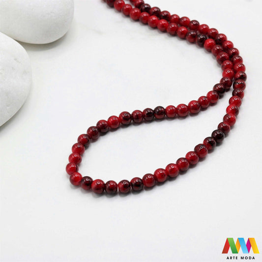 stakleni niz staklo perle zrna zrno staklena perla okrugle okrugla Staklene okrugle perle koje služe za nizanje i izradu nakita poput narukvica i ogrlica te torbica i ostalih modnih dodataka